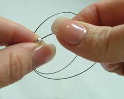 Bead end on a length of wire